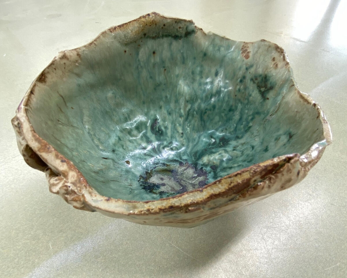 Not of this World: “This hand-sculpted bowl is a study in texture and transformation. The exterior features raw, rugged layers that echo the weathered spirit of the coastline, while the interior is finished in a vibrant, fluid seascape glaze that seems alm Not of this World: “This hand-sculpted bowl is a study in texture and transformation. The exterior features raw, rugged layers that echo the weathered spirit of the coastline, while the interior is finished in a vibrant, fluid seascape glaze that seems alm